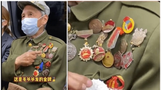 9旬老兵掛滿勛章坐地鐵被圍觀